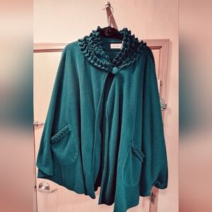 Teal green cape by Le Moda. Length- 33.5 inches. One size fits most